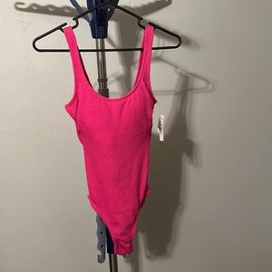 Pink one piece never worn with hygiene strip and tags from Walmart